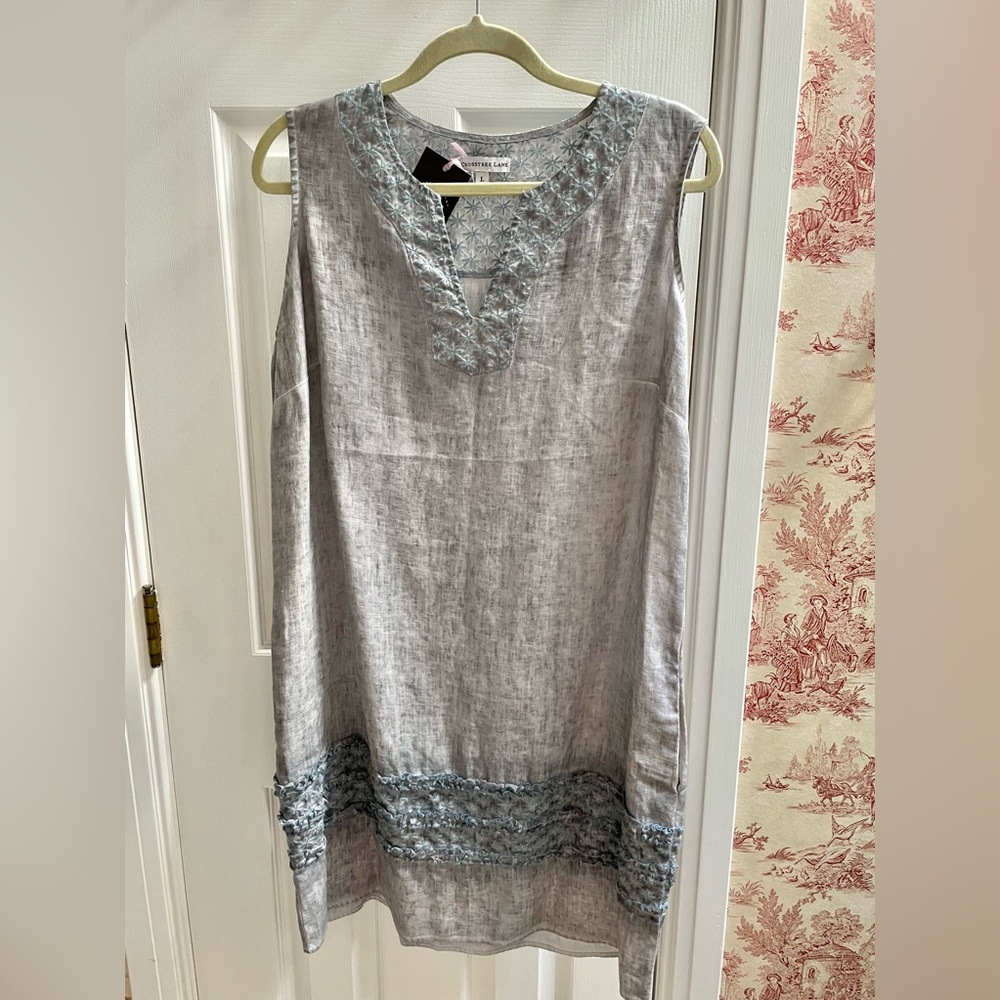 Light blue linen dress with beautiful accents. Size L.